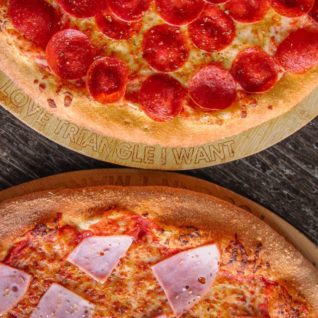 Two XL Pizzas (One Topping Each).