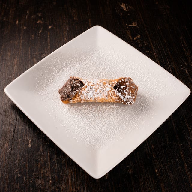 Cannoli & Vanilla Cream Topped With Dulce De Leche.