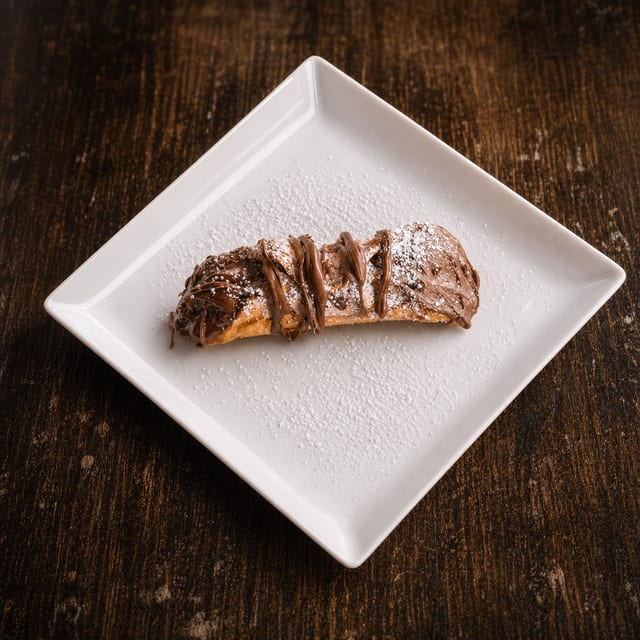 Cannoli & Vanilla Cream Topped With Nutella.